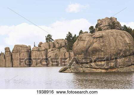 Stock Photograph - Rocky Shores Of Sylvan Lake In Custer State Park; South Dakota Usa. Fotosearch