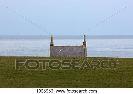 Rooftop Of A Building Along The Water's Edge; Northumberland, England View Large Photo Image Stock Image - Rooftop Of A Building Along The Water's Edge; Northumberland, England. Fotosearch