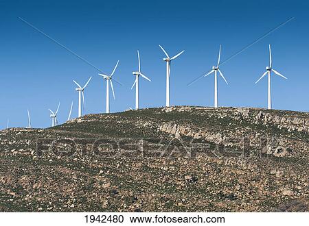 Stock Image - Row Of Windmills; Tarifa Spain. Fotosearch