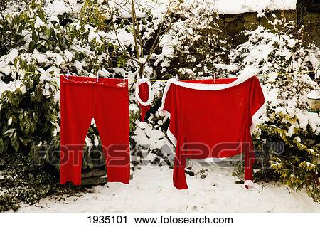 Santa Costume Drying On Clothesline Outdoors During The Winter; Newbrough, Northumberland, England View Large Photo Image Stock Image - Santa Costume Drying On Clothesline Outdoors During The Winter; Newbrough, Northumberland, England. Fotosearch