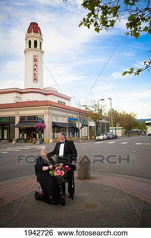 Stock Photograph - Senior Couple Out On The Town; Bellingham Washington United States Of America. Fotosearch