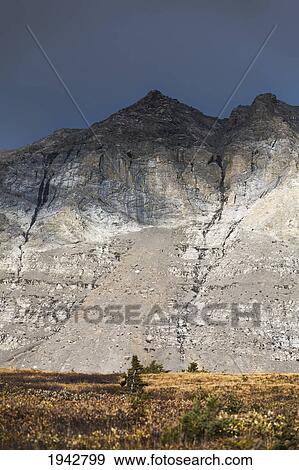Stock Photo - Shadow Of A Cloud On A Mountain; Jasper Alberta Canada. Fotosearch