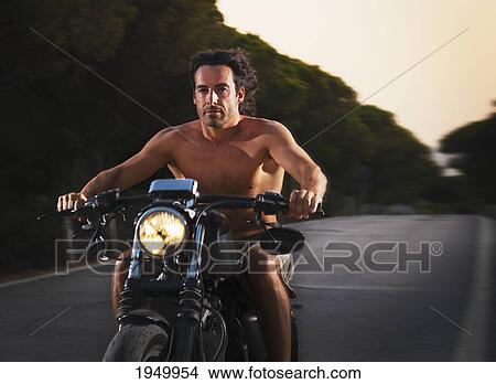 shirtless man riding a motorcycle; tarifa cadiz andalusia spain View Large Photo Image Picture - shirtless man riding a motorcycle; tarifa cadiz andalusia spain. Fotosearch
