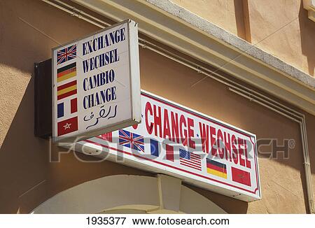 Sign In Five Languages Above Money Exchange Shop; Gibraltar View Large Photo Image Stock Photo - Sign In Five Languages Above Money Exchange Shop; Gibraltar. Fotosearch