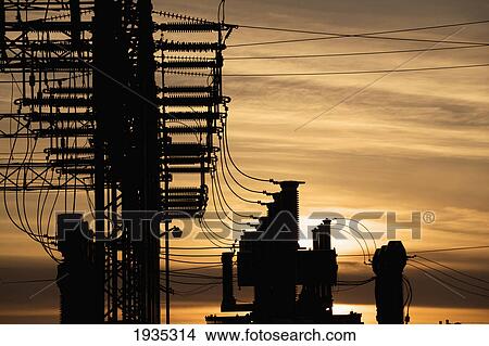Silhouette Of Electrical Substation At Sunset; Fort Saskatchewan, Alberta, Canada View Large Photo Image Picture - Silhouette Of Electrical Substation At Sunset; Fort Saskatchewan, Alberta, Canada. Fotosearch