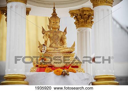 Small Gold Seated Thai Buddha; Bangkok, Thailand View Large Photo Image Stock Image - Small Gold Seated Thai Buddha; Bangkok, Thailand. Fotosearch