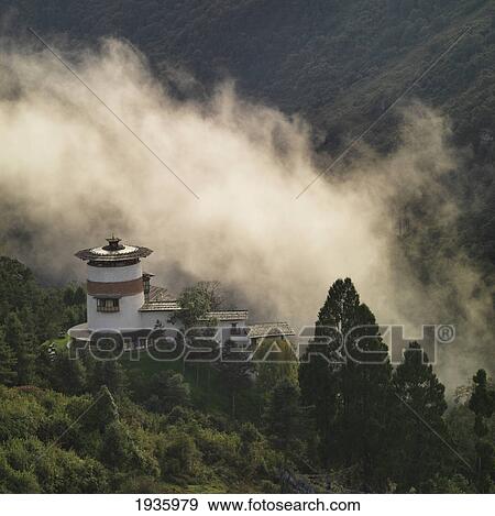 Smoke Rising Up A Mountainside To A Building; Trongsa District Bhutan View Large Photo Image Stock Photo - Smoke Rising Up A Mountainside To A Building; Trongsa District Bhutan. Fotosearch