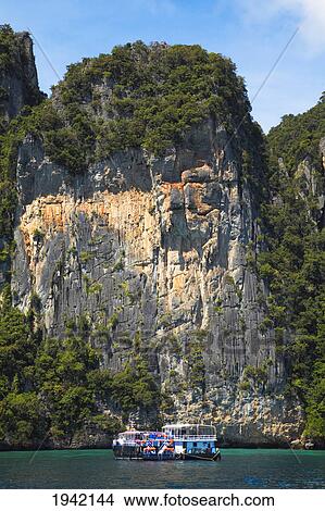 Picture - Snorkeling Boats Anchored Near Koh Phi Phi; Phuket Thailand. Fotosearch