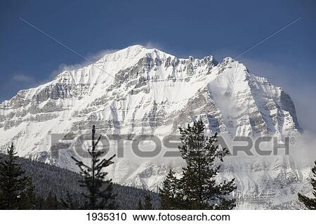 Snow-Covered Mount Temple; Lake Louise, Alberta, Canada View Large Photo Image Stock Image - Snow-Covered Mount Temple; Lake Louise, Alberta, Canada. Fotosearch