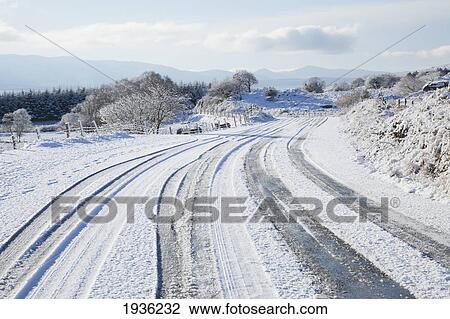 Snow-Covered Road; Tahilla County Kerry Ireland View Large Photo Image Stock Image - Snow-Covered Road; Tahilla County Kerry Ireland. Fotosearch