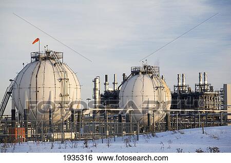 Spherical Oil Tanks And Refinery In Winter At Sunset; Fort Saskatchewan, Alberta, Canada View Large Photo Image Stock Photograph - Spherical Oil Tanks And Refinery In Winter At Sunset; Fort Saskatchewan, Alberta, Canada. Fotosearch