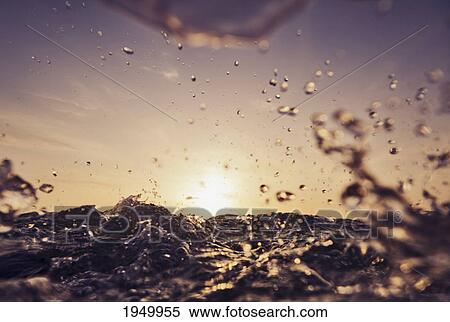 Stock Photography - splashing water at sunset; tarifa cadiz andalusia spain. Fotosearch