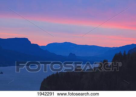Stock Image - Sunrise Over Crown Point And Vista House Columbia River Gorge National Scenic Area In The Pacific Northwest; Oregon United States Of America. Fotosearch