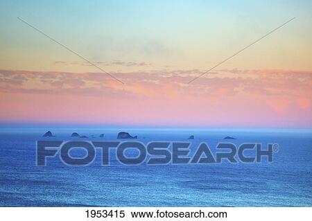 Stock Photography - sunrise over rock formations at cape blanco; oregon united states of america. Fotosearch