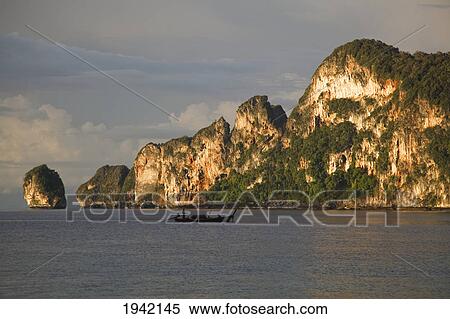 Sunset On The Coastline Near Koh Phi Phi; Phuket Thailand View Large Photo Image Stock Photography - Sunset On The Coastline Near Koh Phi Phi; Phuket Thailand. Fotosearch