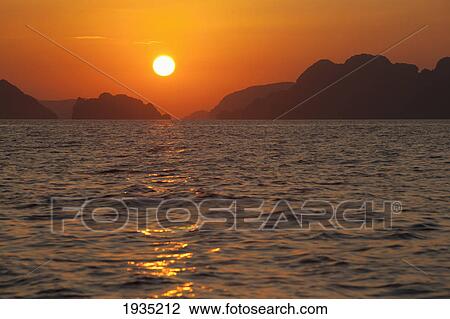Stock Image - Sunset View Of Tropical Islands From The Beaches Of Corong Corong Near El Nido; Bacuit Archipelago, Philippines. Fotosearch