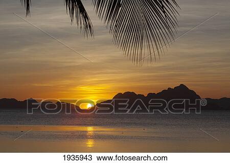 Sunset View Of Tropical Islands From The Beaches Of Corong Corong; El Nido, Bacuit Archipelago, Palawan, Philippines View Large Photo Image Stock Image - Sunset View Of Tropical Islands From The Beaches Of Corong Corong; El Nido, Bacuit Archipelago, Palawan, Philippines. Fotosearch
