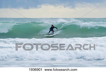 Stock Image - Surfing; Bunker Beach Tarifa Spain. Fotosearch