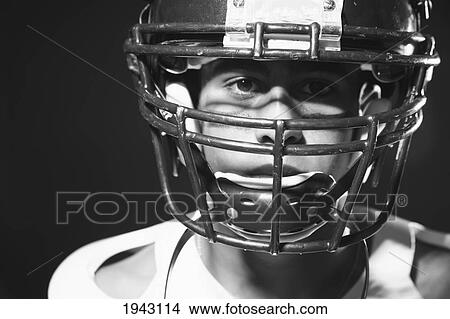 Picture - Teenage Boy Football Player; Troutdale Oregon United States Of America. Fotosearch