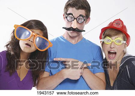 Teenagers Wearing Funny Disguises; Troutdale Oregon United States Of America View Large Photo Image Stock Photo - Teenagers Wearing Funny Disguises; Troutdale Oregon United States Of America. Fotosearch