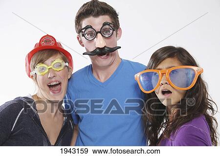 Teenagers Wearing Funny Disguises; Troutdale Oregon United States Of America View Large Photo Image Stock Photo - Teenagers Wearing Funny Disguises; Troutdale Oregon United States Of America. Fotosearch