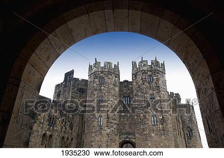 Stock Image - The Alnwick Castle, Most Famously Known As Hogwarts Castle In The Harry Potter Series; Alnwick, England. Fotosearch
