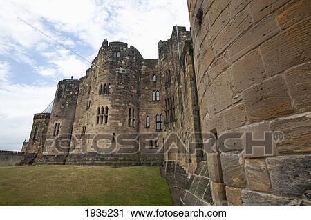 The Alnwick Castle, Most Famously Known As Hogwarts Castle In The Harry Potter Series; Alnwick, England View Large Photo Image Stock Image - The Alnwick Castle, Most Famously Known As Hogwarts Castle In The Harry Potter Series; Alnwick, England. Fotosearch