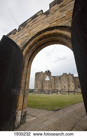 Stock Image - The Alnwick Castle, Most Famously Known As Hogwarts Castle In The Harry Potter Series; Alnwick, England. Fotosearch