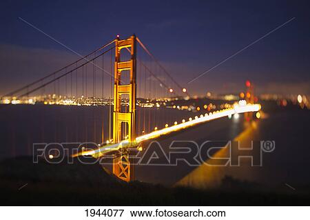 The Golden Gate Bridge Illuminated At Night; San Francisco California United States Of America View Large Photo Image Stock Photo - The Golden Gate Bridge Illuminated At Night; San Francisco California United States Of America. Fotosearch