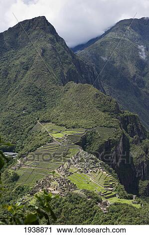 Stock Image - The Historic Lost City Of Inca Machu Picchu; Peru. Fotosearch