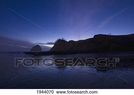 Stock Image - The Pacific Ocean Along The Coast At Sunset; Pacific City Oregon United States Of America. Fotosearch