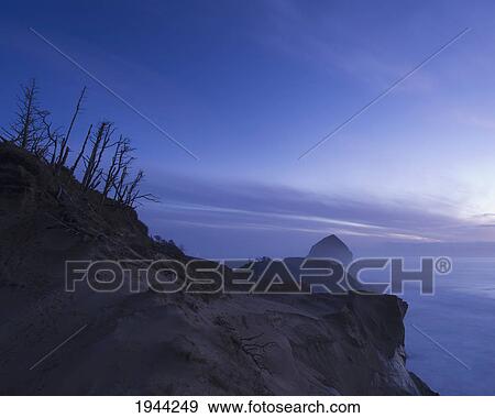 Stock Photo - the rugged coastline with fog; pacific city oregon united states of america. Fotosearch