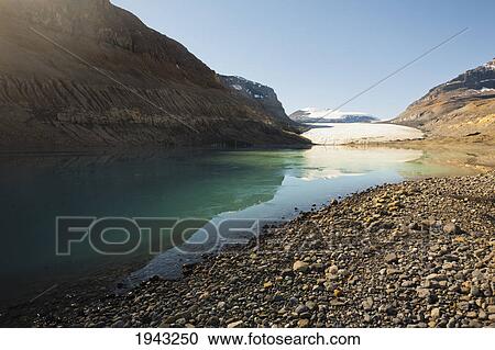 Stock Image - The Saskatchewan Glacier From The Glacial Plain Beside The Lake; Banff Alberta Canada. Fotosearch