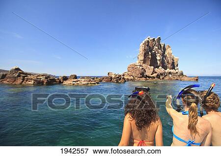Tourists With Snorkeling Gear At Los Islotes National Marine Park Espiritu Santo Island; La Paz Baja California Mexico View Large Photo Image Stock Photo - Tourists With Snorkeling Gear At Los Islotes National Marine Park Espiritu Santo Island; La Paz Baja California Mexico. Fotosearch