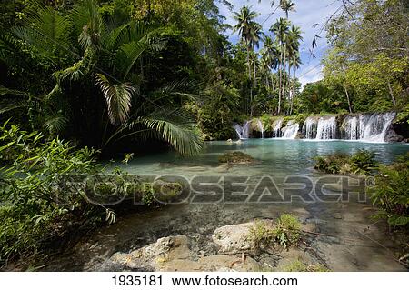 Tranquil Waterfall Scenic; Cambugahay Falls, Siquijor, Philippines View Large Photo Image Stock Image - Tranquil Waterfall Scenic; Cambugahay Falls, Siquijor, Philippines. Fotosearch