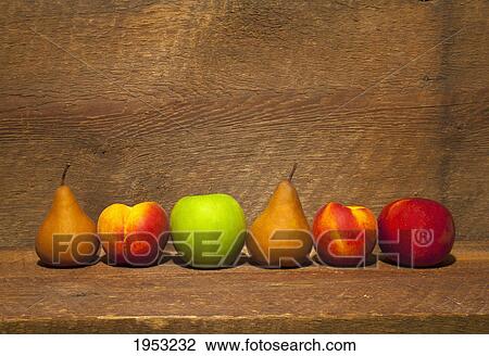 variety of fruit in a row on a wooden shelf; waterloo quebec canada View Large Photo Image Stock Image - variety of fruit in a row on a wooden shelf; waterloo quebec canada. Fotosearch