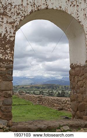 Stock Image - View Of A Landscape Through An Archway Of A Building; Chinchero Peru. Fotosearch