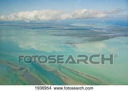 Picture - View Of The Ocean And Clouds In The Sky; South Caicos Turks And Caicos Islands. Fotosearch
