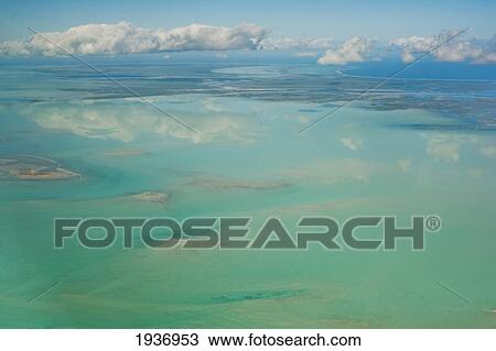 Stock Image - View Of The Ocean And Clouds In The Sky; South Caicos Turks And Caicos Islands. Fotosearch