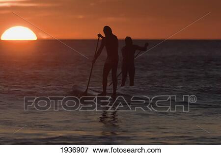Stock Photo - Wakeboarding At Sunset; Los Lances Beach Tarifa Spain. Fotosearch