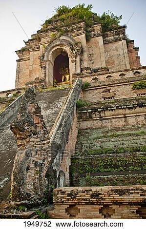 Stock Image - wat phra singh is located in the old city centre; chiang mai thailand. Fotosearch