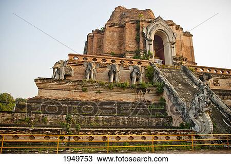 Stock Image - wat phra singh is located in the old city centre; chiang mai thailand. Fotosearch