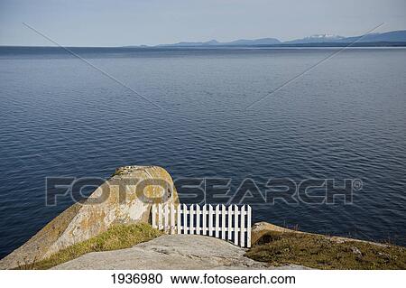 White Picket Fence Along The Cliff On The Coast; British Columbia Canada View Large Photo Image Stock Image - White Picket Fence Along The Cliff On The Coast; British Columbia Canada. Fotosearch