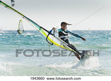 Stock Image - Windsurfing Off Punta Paloma; Tarifa Cadiz Andalusia Spain. Fotosearch