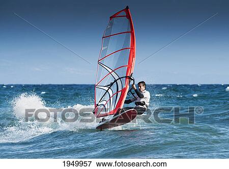 windsurfing off the coast at hotel dos mares; tarifa cadiz andalusia spain View Large Photo Image Stock Photo - windsurfing off the coast at hotel dos mares; tarifa cadiz andalusia spain. Fotosearch