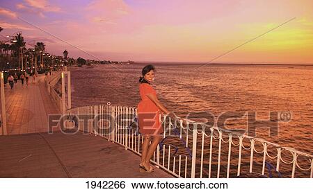 Woman In National Marine Park At Sunset; Espiritu Santos Island Baja California Mexico View Large Photo Image Stock Photograph - Woman In National Marine Park At Sunset; Espiritu Santos Island Baja California Mexico. Fotosearch