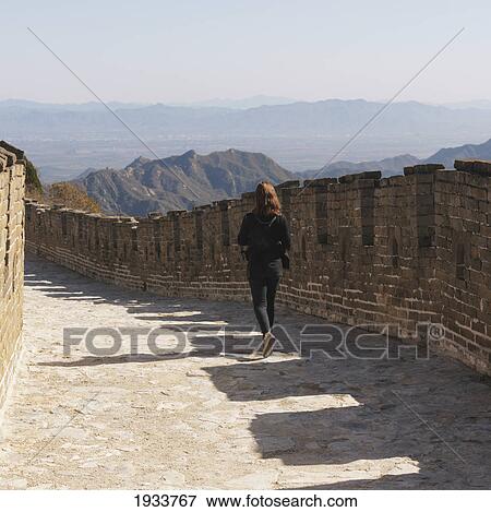Woman On The Mutianyu Section Of The Great Wall Of China; Beijing, China View Large Photo Image Stock Photo - Woman On The Mutianyu Section Of The Great Wall Of China; Beijing, China. Fotosearch