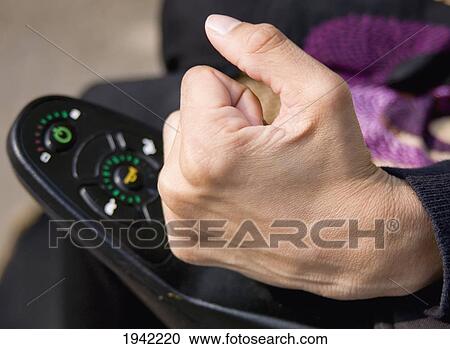Woman's Hand Contolling Her Power Wheelchair; Bolton Lancashire England View Large Photo Image Stock Image - Woman's Hand Contolling Her Power Wheelchair; Bolton Lancashire England. Fotosearch