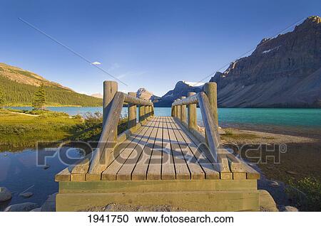Wooden Foot Bridge And View Of Glacial Lake In Banff National Park; Banff Alberta Canada View Large Photo Image Stock Image - Wooden Foot Bridge And View Of Glacial Lake In Banff National Park; Banff Alberta Canada. Fotosearch