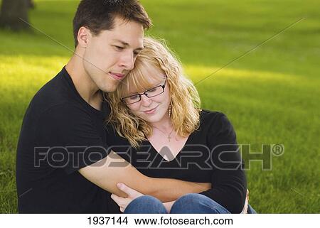 Picture - Young Couple Together In Robbins Island Park; Willmar Minnesota Usa. Fotosearch